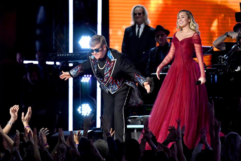 Elton John e Miley Cyrus