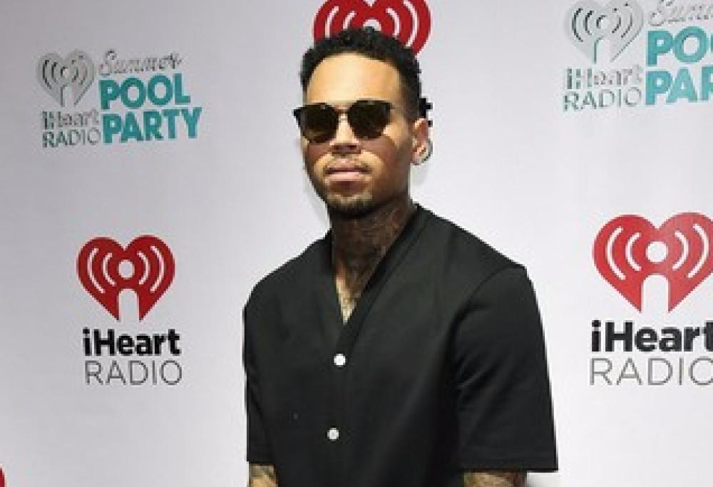 Chris Brown, il volto della figlia diventa un tatuaggio