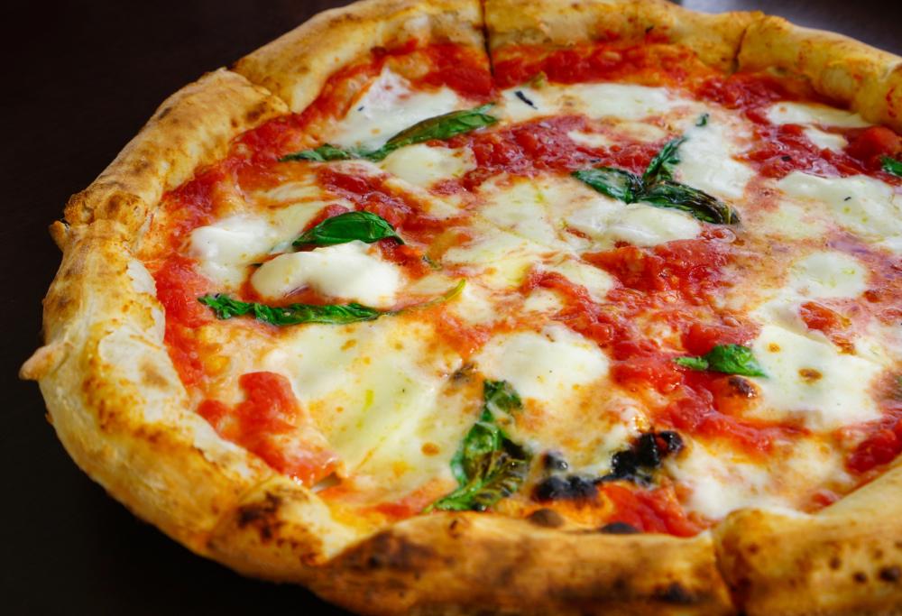 La pizza è l'alimento che rende più felici: la scienza lo conferma