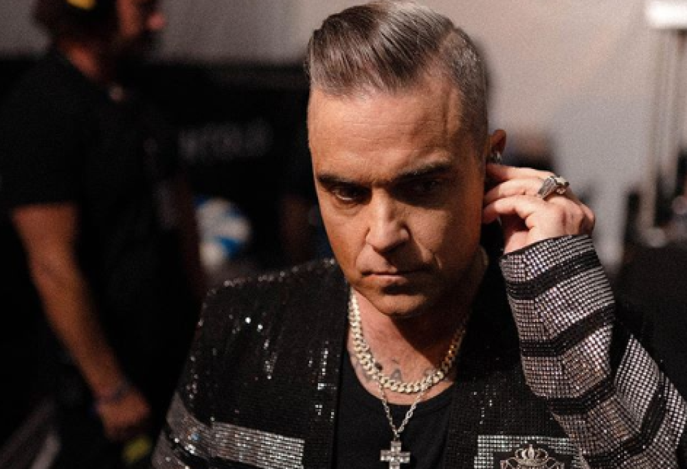 Robbie Williams confessa: “Ero depresso e non sono riuscito ad aiutare Zayn Malik degli One Direction”