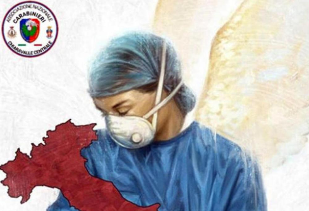 Coronavirus, l’immagine dell’infermiera che cura l’Italia diventa virale