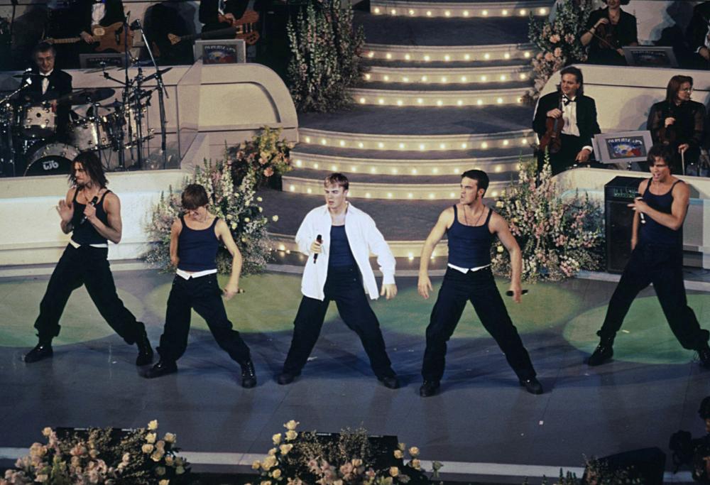 Reunion dei Take That nel 2022? Le parole di Robbie Williams