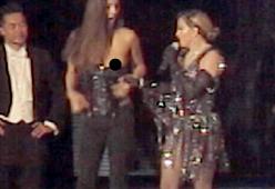 Madonna arriva tardi al concerto e denuda il seno di una fan: Capriccio da Diva? No, una divina lezione di stile e arte "sacra"! 