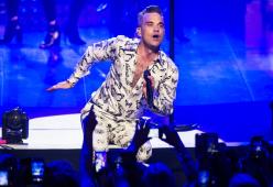 Robbie Williams accusa Jimmy Page: "Mi spia"
