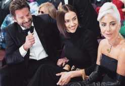 Agli Oscar, la fidanzata di Bradley Cooper si siede tra lui e Lady Gaga