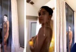 Belen Rodriguez a seno nudo in uno shooting super bollente 
