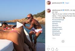 Gianluca Vacchi "suona" il lato B delle modelle e scatena la polemica